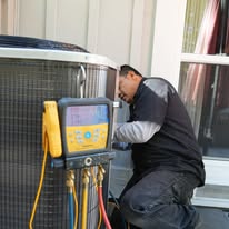 Home 13 Airstars Airstars technician working on HVAC equipment - the Bay Area